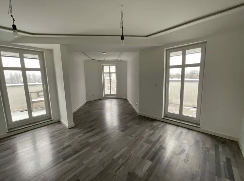Moderne DG-Wohnung mit Fußbodenheizung — photo 1